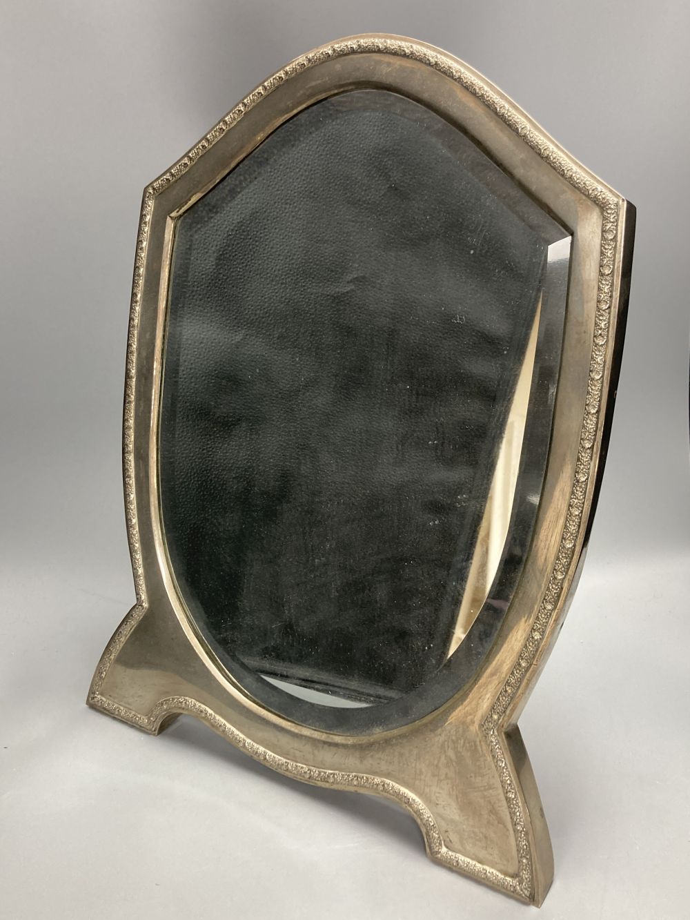 A 20th century Austro Hungarian 800 standard white metal mounted toilet mirror, height 49.3cm.